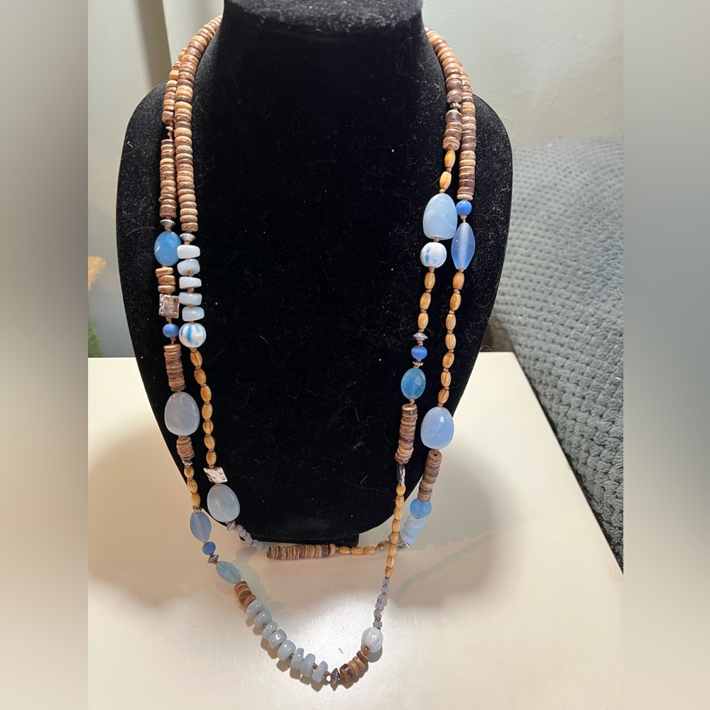 Chico’s double strand beaded statement necklace, shades of blue, natural tones.